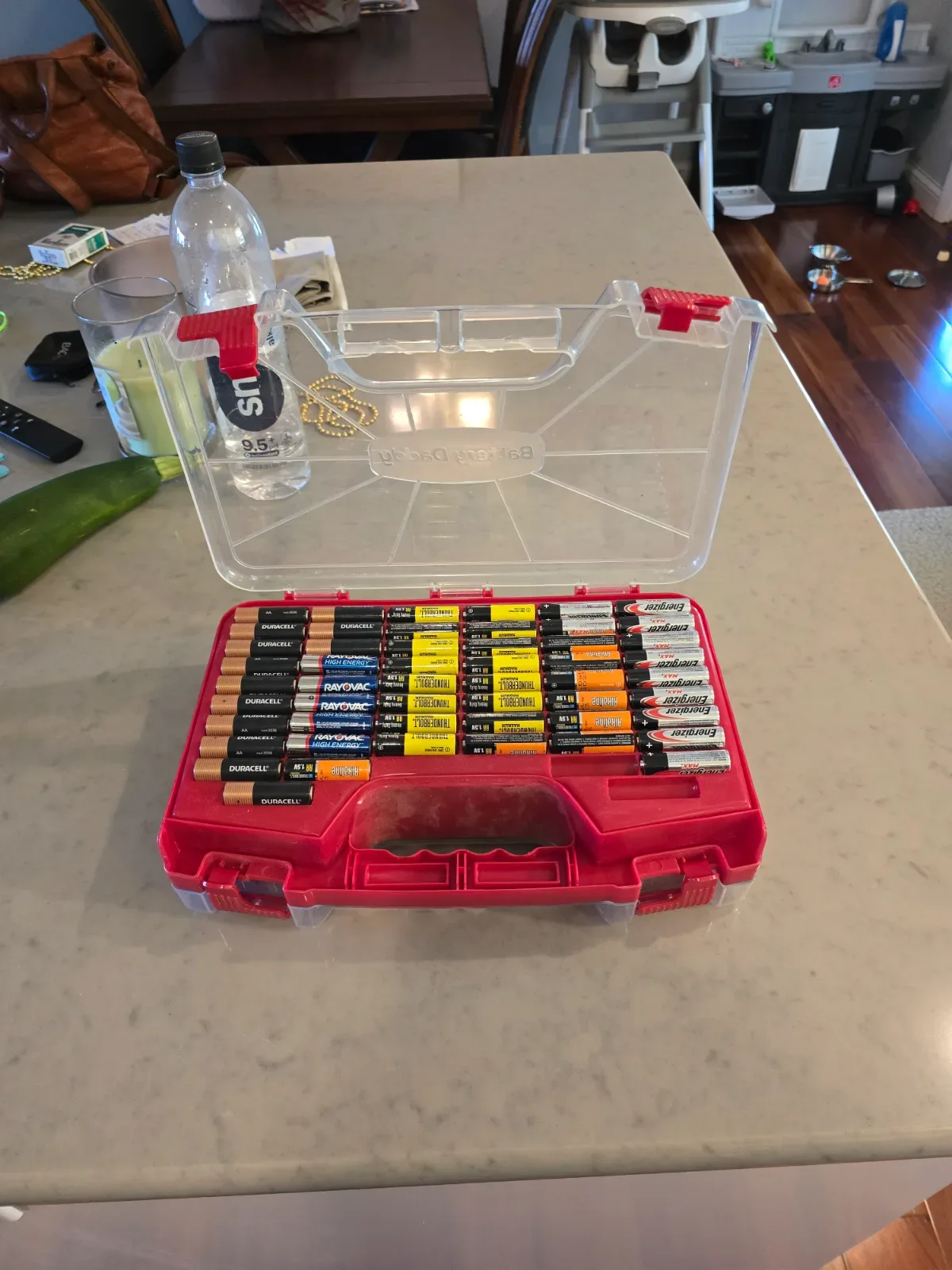 Open Battery Daddy case showing sorted compartments filled with AA, AAA, C, D, and 9V batteries